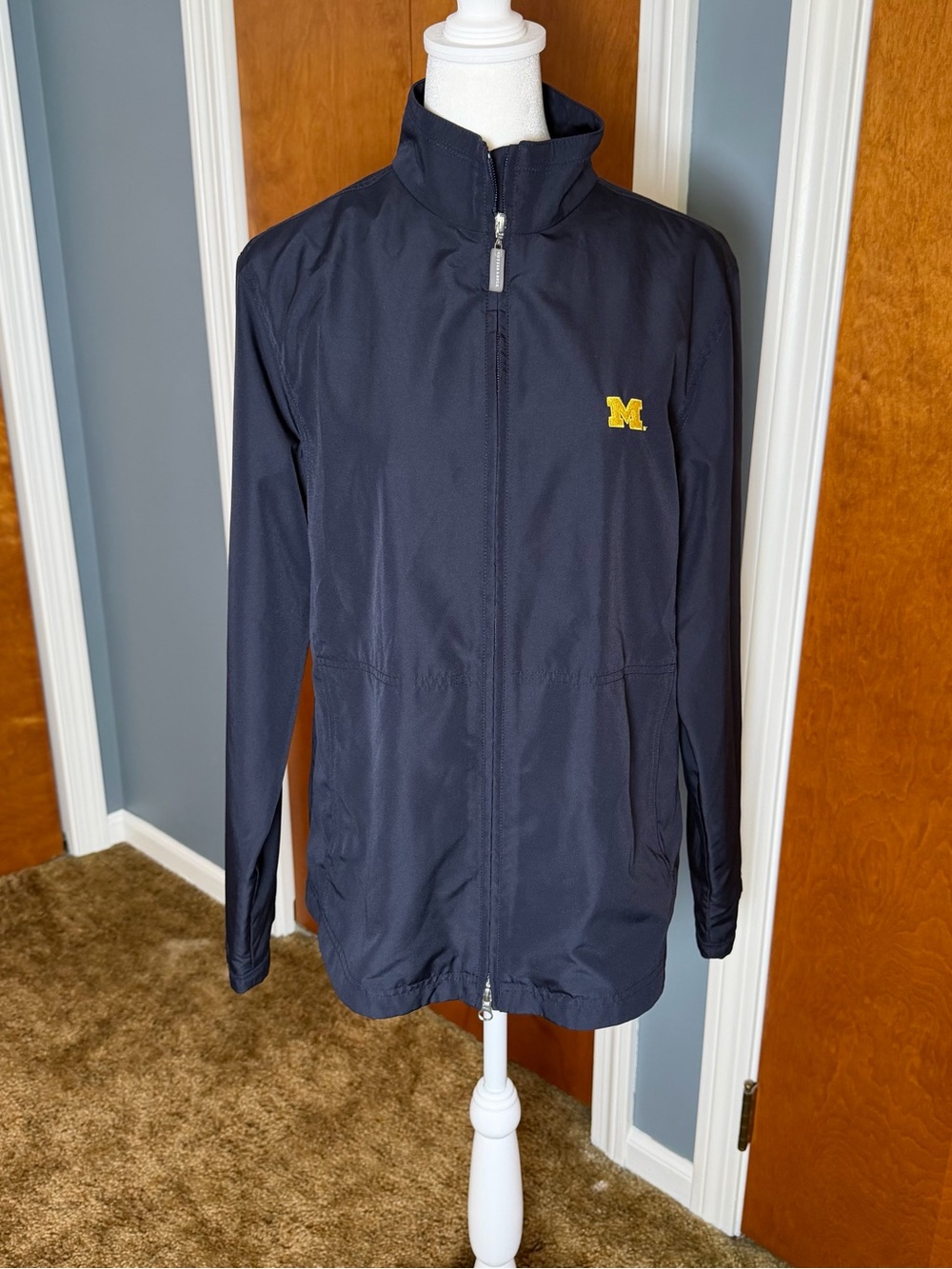 Cutter & Buck Michigan Navy Rain Jacket with Yellow 'M' Patch. Women’s large.